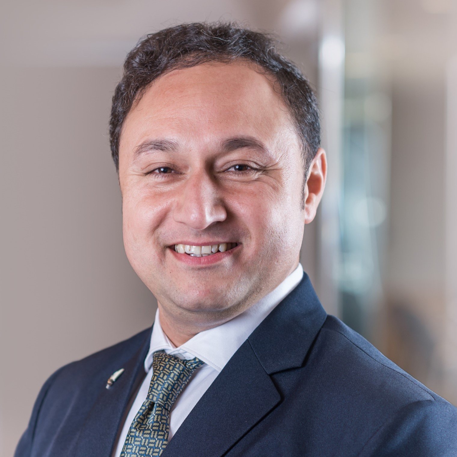 Dr. Rajiv Chhibber